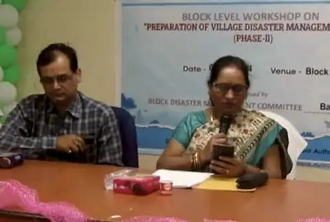 Officials and WCWS staff at a block-level workshop on village disaster management plans.